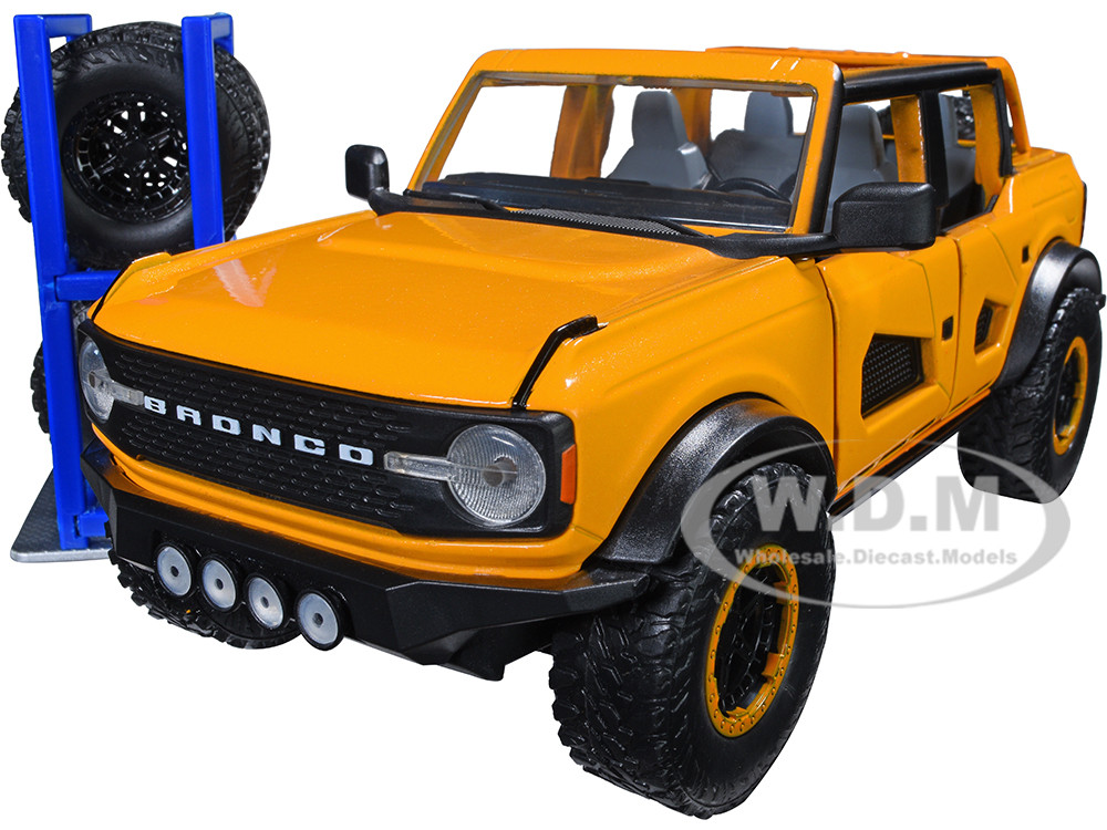 2021 Ford Bronco Orange Metallic with Extra Wheels "Just Trucks" Series 1/24 Diecast Model Car by Jada diecast model