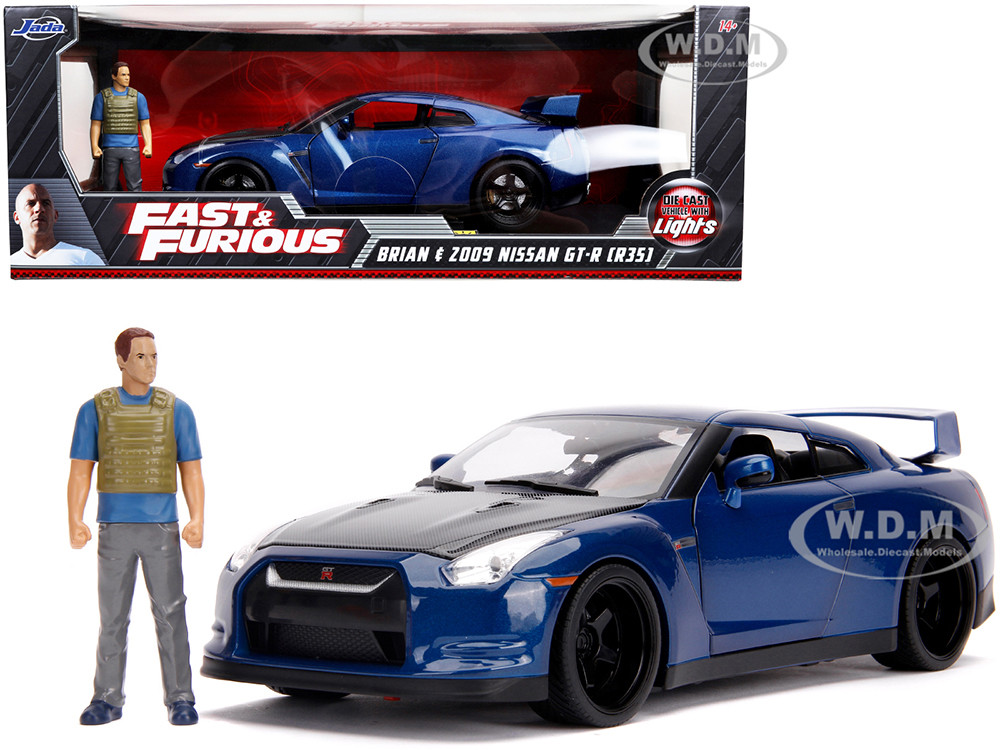 2009 Nissan GT-R (R35) Blue Metallic and Carbon with Lights and Brian Figurine "Fast & Furious" Movie 1/18 Diecast Model Car by Jada diecast model