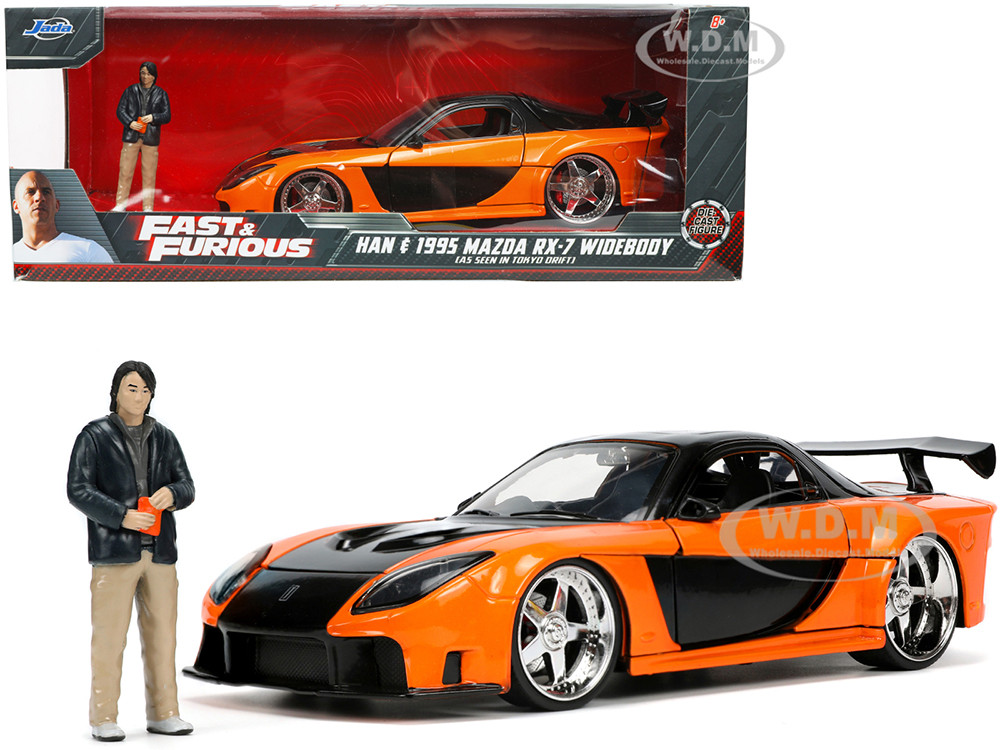 1995 Mazda RX-7 Widebody RHD (Right Hand Drive) Orange Metallic and Black with Han Diecast Figurine "The Fast and the Furious: Tokyo Drift" (2006) Movie 1/24 Diecast Model Car by Jada diecast model