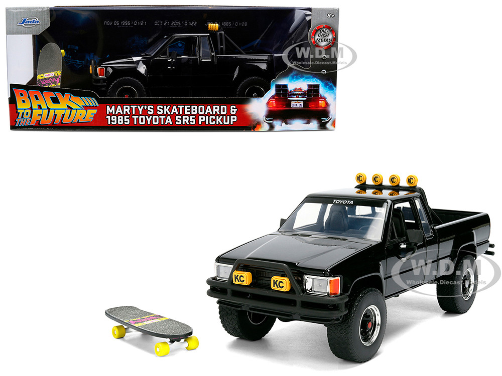 1985 Toyota SR5 Pickup Truck Black with Marty's Skateboard "Back to the Future" (1985) Movie "Hollywood Rides" Series 1/24 Diecast Model Car by Jada diecast model
