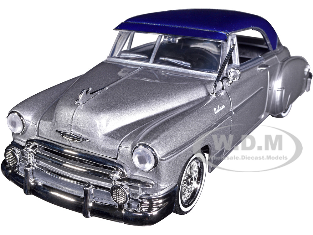 1950 Chevrolet Bel Air Lowrider Silver Metallic with Blue Metallic Top "Get Low" Series 1/24 Diecast Model Car by Motormax diecast model