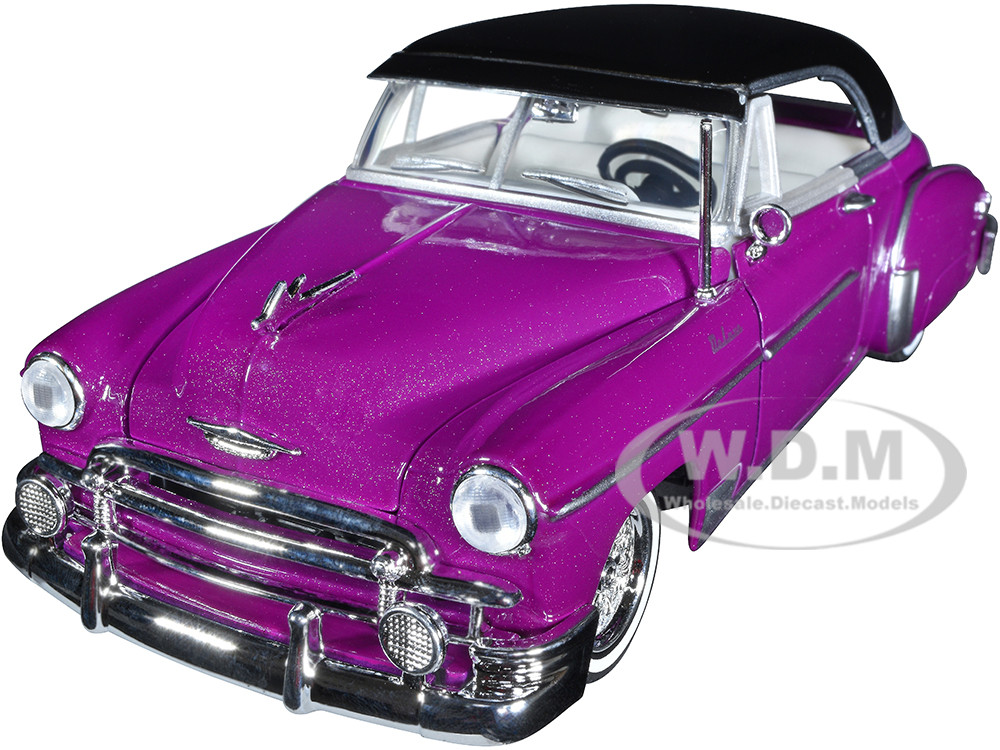 1950 Chevrolet Bel Air Lowrider Purple Metallic with Black Top and White Interior "Get Low" Series 1/24 Diecast Model Car by Motormax diecast model