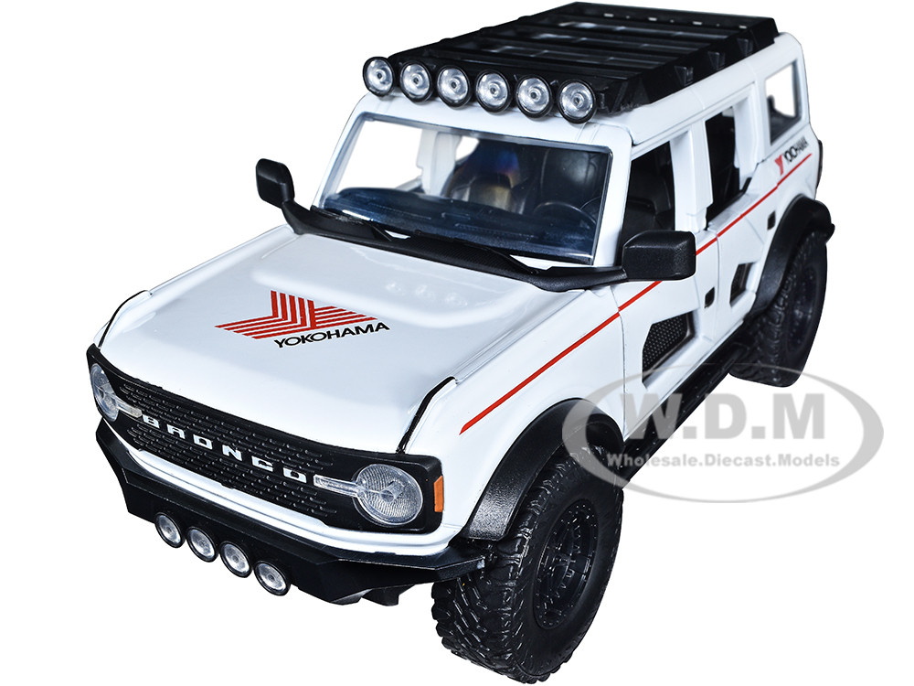 2021 Ford Bronco White with Red Stripes and Roof Rack "Yokohama Tires" "Just Trucks" Series 1/24 Diecast Model Car by Jada diecast model