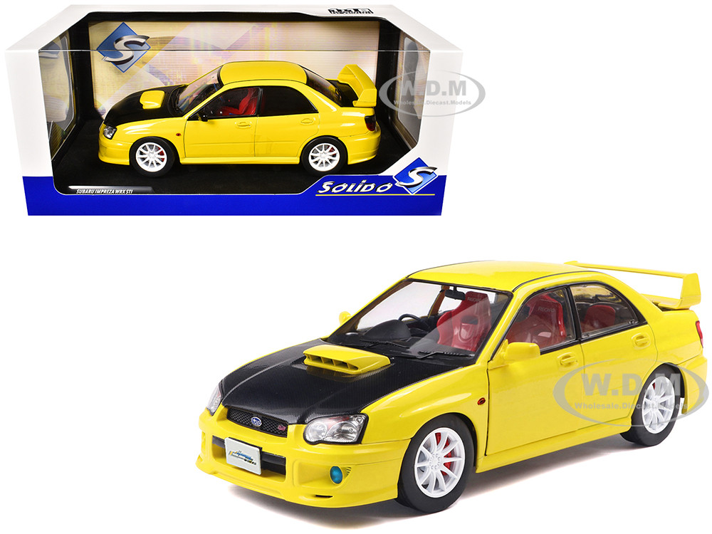2003 Subaru Impreza WRX STI RHD (Right Hand Drive) Yellow with Carbon Hood 1/18 Diecast Model Car by Solido diecast model