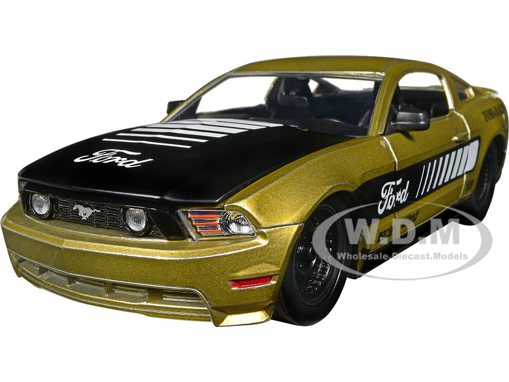 2010 Ford Mustang GT Gold Metallic with Black Graphics and Hood "Tom's Racing" "Bigtime Muscle" Series 1/24 Diecast Model Car by Jada diecast model