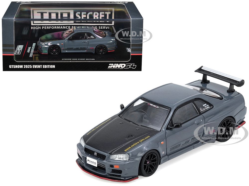 Nissan Skyline GT-R (R34) "Top Secret" RHD (Right Hand Drive) Stealth Gray with Carbon Hood "GTSHOW 2025 Event Edition" 1/64 Diecast Model Car by Inno Models diecast model