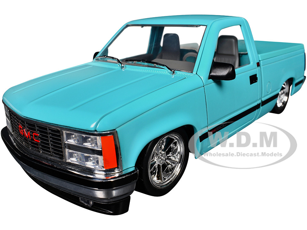 1988 GMC Sierra 1500 Custom Pickup Truck Light Blue with Black Stripes Limited Edition to 9250 pieces Worldwide 1/24 Diecast Model Car by M2 Machines diecast model
