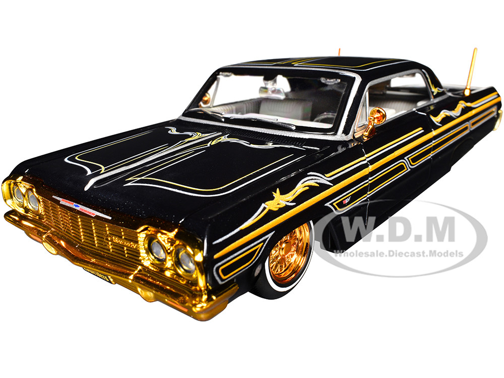 1964 Chevrolet Impala SS Lowrider Black Metallic with Gold Graphics and Gray Interior "Lowriders" "Maisto Design" Series 1/26 Diecast Model Car by Maisto diecast model