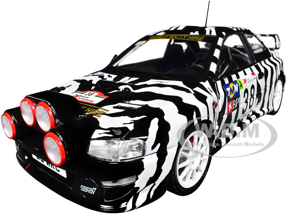 Subaru Impreza S5 WRC99 #38 Nigel Heath - Steve Lancaster "Rallye de Portugal" (2001) "Competition" Series 1/18 Diecast Model Car by Solido diecast model