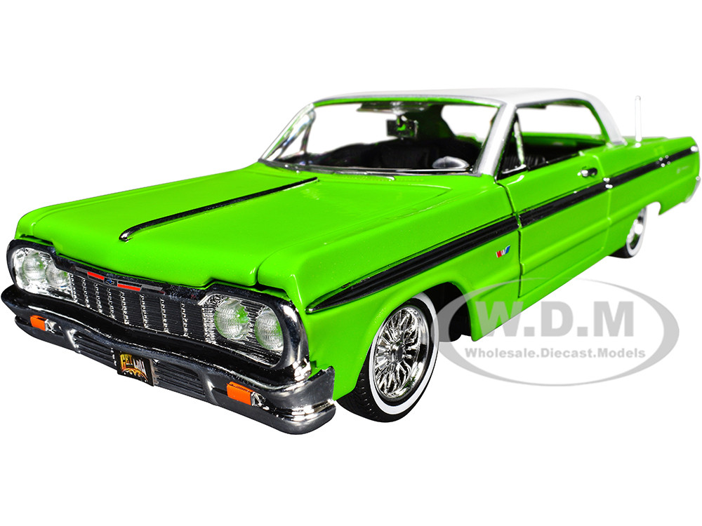 1964 Chevrolet Impala Lowrider Hard Top Green with White Top "Get Low" Series 1/24 Diecast Model Car by Motormax diecast model