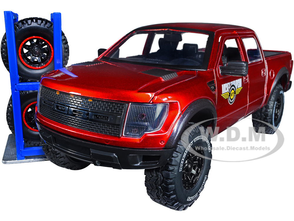 2011 Ford F-150 SVT Raptor Pickup Truck Candy Red Metallic "Mickey Thompson Tires & Wheels" with Extra Wheels "Just Trucks" Series 1/24 Diecast Model Car by Jada diecast model
