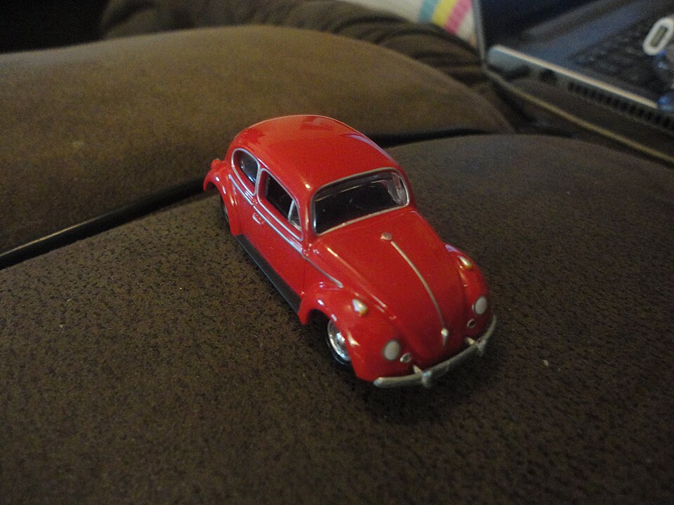 Red Johnny Lightning Volkswagen Beetle, a model car by Johnny Lightning