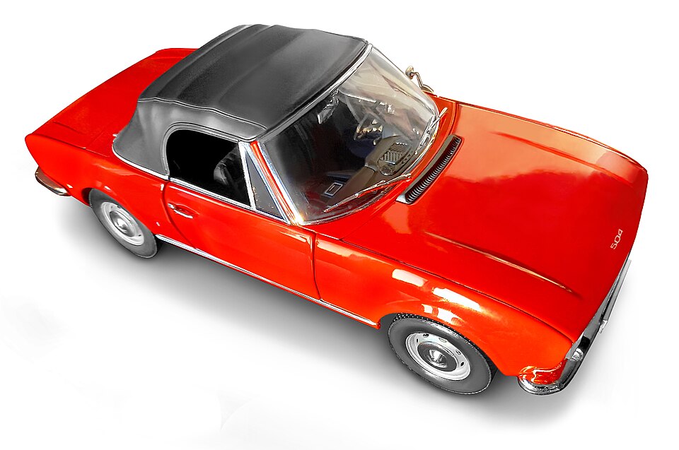 Peugeot 504 Cabriolet rouge corail, a model car by Norev