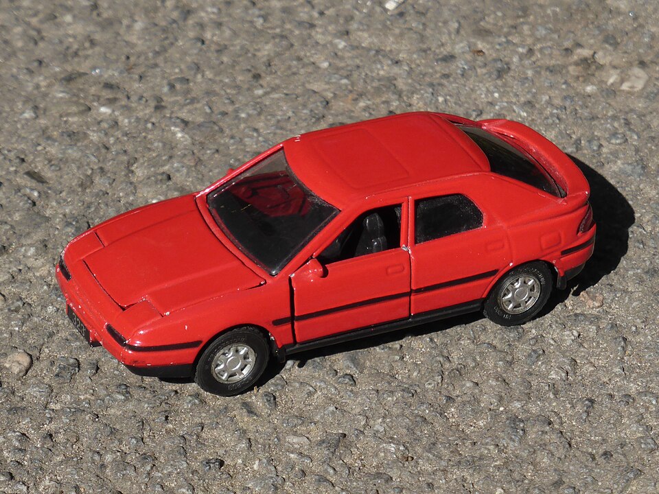 Yonezawa Mazda 323F, a model car by Yonezawa Toys