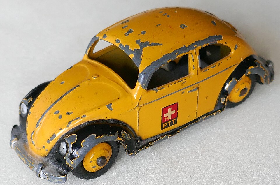 Dinky Toy VW Beetle PTT Switzerland-worn-01, a model car by Dinky Toy cars