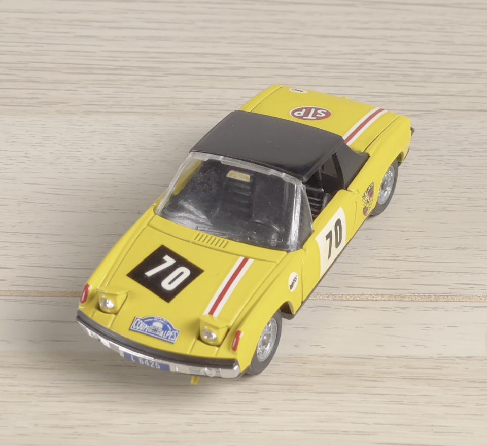 Porsche Solido avec phare en strass, a model car by Solido