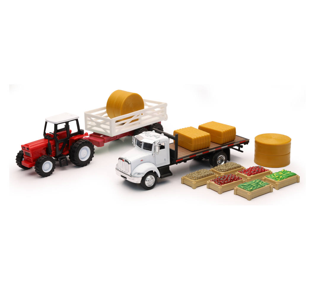New-Ray Peterbilt Flatbed W/ Farm Tractor Set diecast model